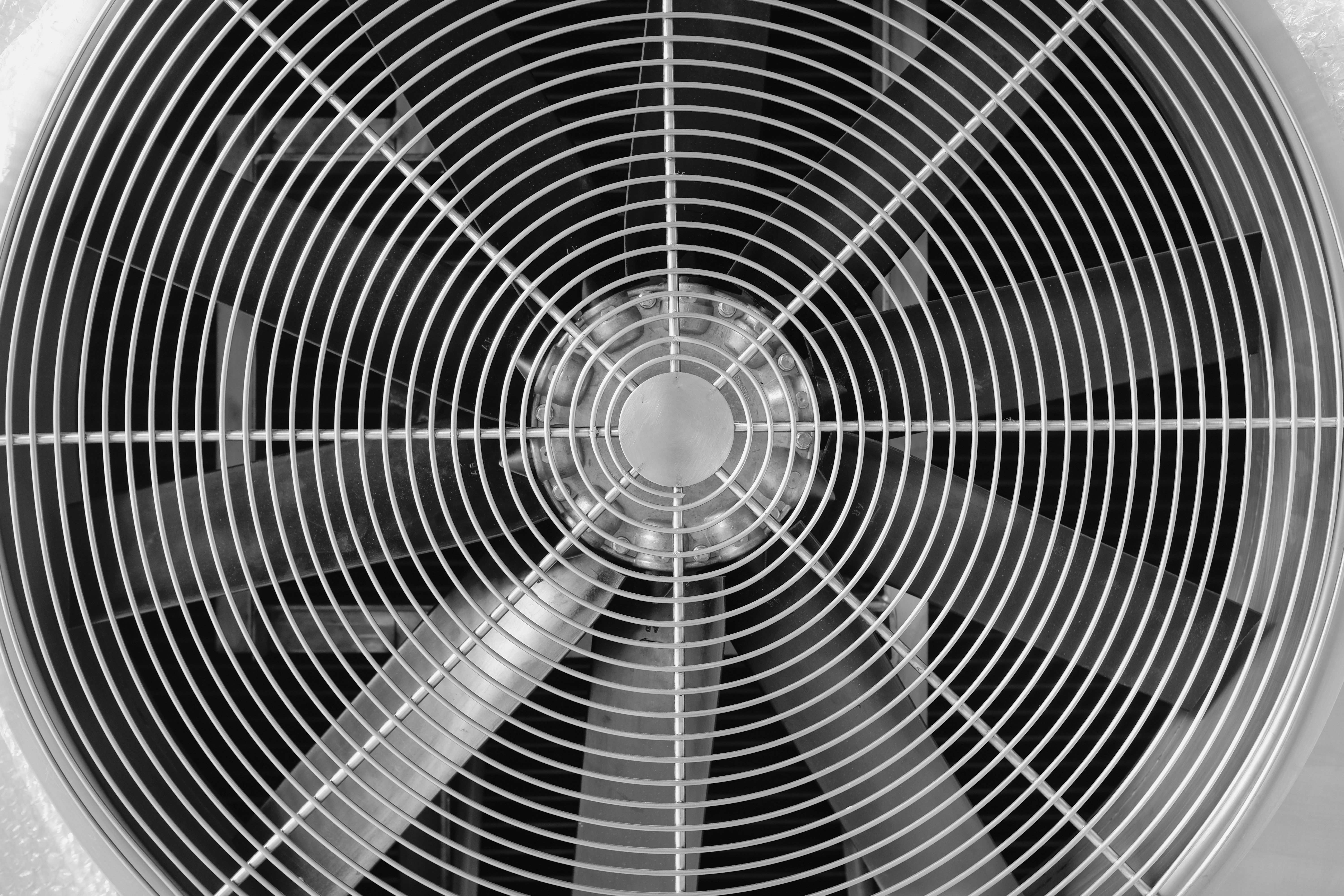 Close-up of a stainless steel industrial ventilation fan Close-up of a stainless steel industrial ventilation fan