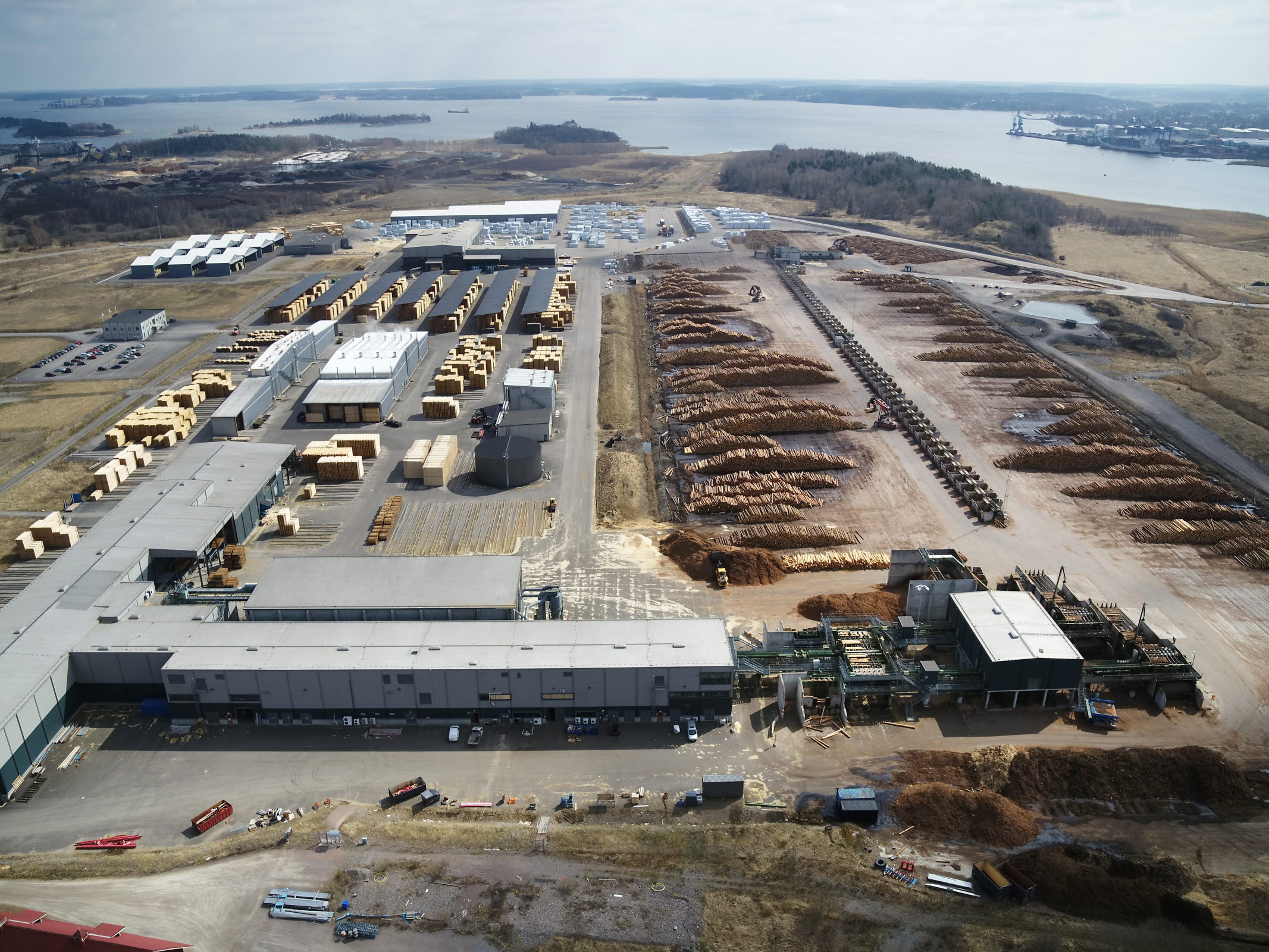 Aerial view of a timber yard, buildings, and stacks of lumber Aerial view of a timber yard, buildings, and stacks of lumber